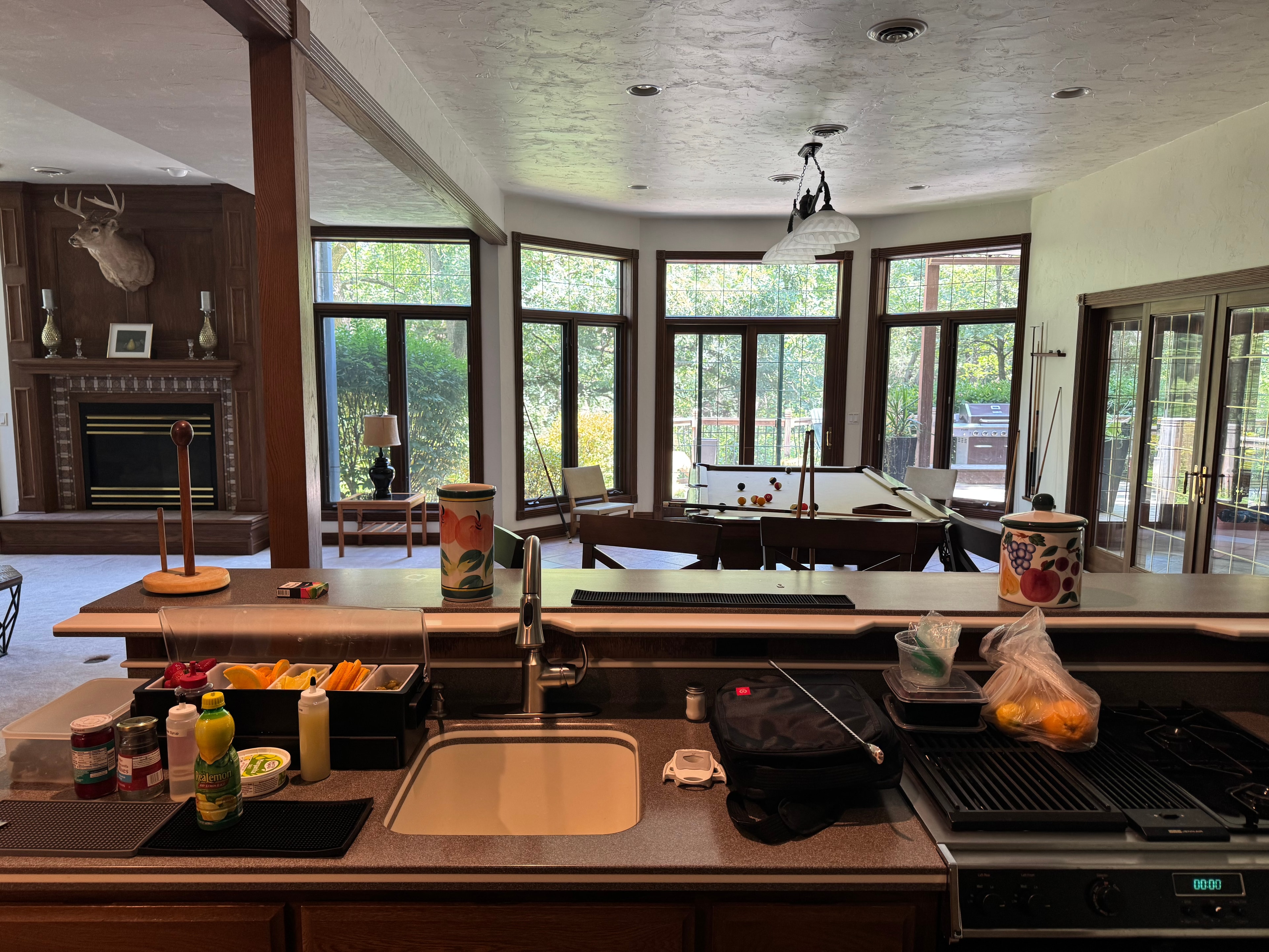 Bachelor party setup at a beautiful Burlington, WI home with pool table and fireplace