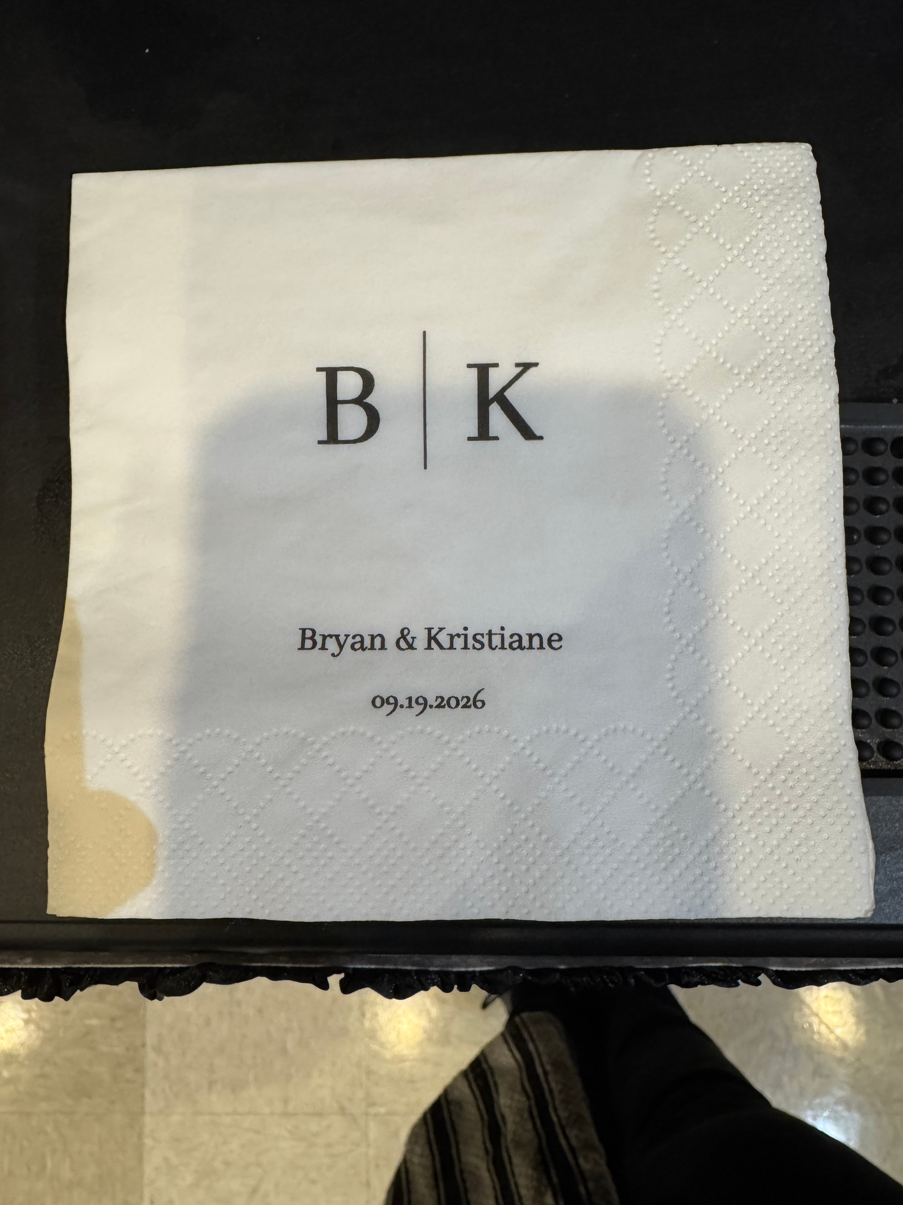 Custom monogrammed cocktail napkin for Bryan & Kristiane, 09.19.2026